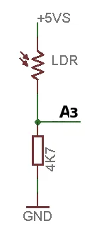 Esquema: la LDR va de +5 V al pin A3, y una resistencia de 4,7 kΩ va de A3 a tierra (GND), formando un divisor de tensión.